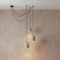 3 Archy Cluster Hooked — pumice stone, black cord — More Circular