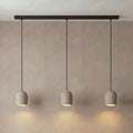 3 Archy Dine — pumice stone, black cord — More Circular