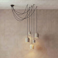 5 Archy Cluster Hooked — pumice stone, black cord — More Circular