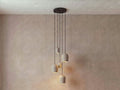 5 Archy Cluster — pumice stone, black cord — More Circular