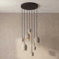 7 Archy Cluster — pumice stone, black cord — More Circular