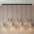 7 Archy Dine — pumice stone, black cord — More Circular