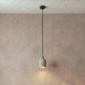 Archy Pendant Mini — pumice stone, black cord — More Circular