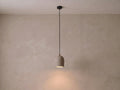 Archy Pendant — pumice stone, black cord — More Circular
